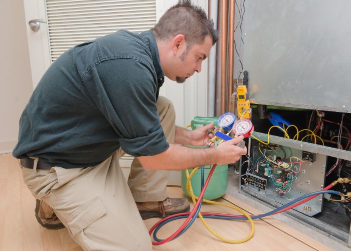 HVAC tech doing heating and cooling in dallas